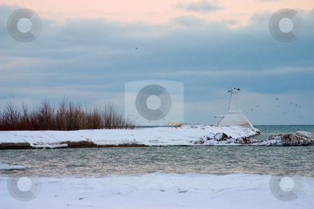 To use this stock image in your creative project, please select the size you need over to the right and click the "Add to Cart" button.
Your downloaded image will come with the Cutcaster watermark removed so don’t worry about the watermark you see on this page. Light House In The Winter stock photo, Light house in a bay on a coast with snow in the foreground by Johan Knelsen