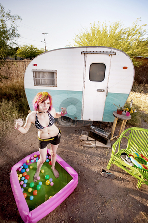To use this stock image in your creative project, please select the size you need over to the right and click the "Add to Cart" button.
Your downloaded image will come with the Cutcaster watermark removed so don’t worry about the watermark you see on this page. Woman flexing in a play pool stock photo, Colorful young woman flexing in a play pool by Scott Griessel