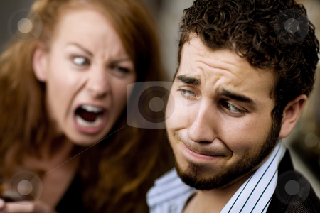 To use this stock image in your creative project, please select the size you need over to the right and click the "Add to Cart" button.
Your downloaded image will come with the Cutcaster watermark removed so don’t worry about the watermark you see on this page. Woman Yells at Man stock photo, Young woman with cocktail yells at a man at party by Scott Griessel