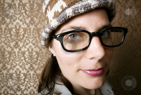 To use this stock image in your creative project, please select the size you need over to the right and click the "Add to Cart" button.
Your downloaded image will come with the Cutcaster watermark removed so don’t worry about the watermark you see on this page. Nerdy Woman in a Knit Cap stock photo, Closeup of Cute Nerdy Woman in a Knit Cap by Scott Griessel