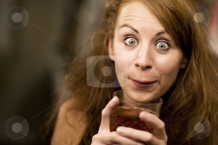 To use this stock image in your creative project, please select the size you need over to the right and click the "Add to Cart" button.
Your downloaded image will come with the Cutcaster watermark removed so don’t worry about the watermark you see on this page. Woman sipping a cocktail stock photo, Woman with big eyes and hair sipping cocktail by Scott Griessel