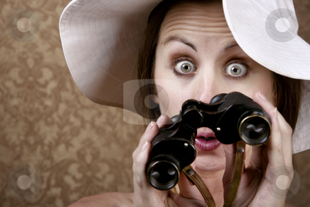 To use this stock image in your creative project, please select the size you need over to the right and click the "Add to Cart" button.
Your downloaded image will come with the Cutcaster watermark removed so don’t worry about the watermark you see on this page. Woman with Sunglasses and Binoculars stock photo, Young Woman with Sunglasses and a Floppy White Hat Looking through Binoculars by Scott Griessel