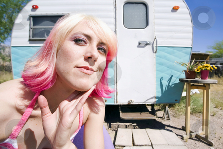 To use this stock image in your creative project, please select the size you need over to the right and click the "Add to Cart" button.
Your downloaded image will come with the Cutcaster watermark removed so don’t worry about the watermark you see on this page. Woman in front of Travel Trailer stock photo, Pretty Woman Front of a Vintage Travel Trailer by Scott Griessel
