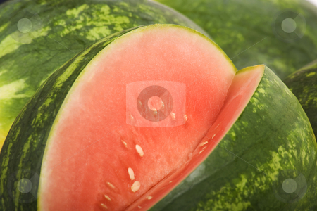 To use this stock image in your creative project, please select the size you need over to the right and click the "Add to Cart" button.
Your downloaded image will come with the Cutcaster watermark removed so don’t worry about the watermark you see on this page. Watermelon stock photo, Bright red and green watermelon with a slice removed by Scott Griessel