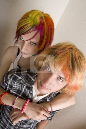 To use this stock image in your creative project, please select the size you need over to the right and click the "Add to Cart" button.
Your downloaded image will come with the Cutcaster watermark removed so don’t worry about the watermark you see on this page. Young Couple with Bright Colored Hair Embrace stock photo, Portrait of Young Couple with Bright Colored Hair Embracing by Scott Griessel