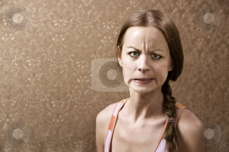 To use this stock image in your creative project, please select the size you need over to the right and click the "Add to Cart" button.
Your downloaded image will come with the Cutcaster watermark removed so don’t worry about the watermark you see on this page. Angry Woman stock photo, Angry Young Woman in front of Gold wallpaper by Scott Griessel