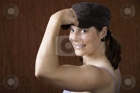 To use this stock image in your creative project, please select the size you need over to the right and click the "Add to Cart" button.
Your downloaded image will come with the Cutcaster watermark removed so don’t worry about the watermark you see on this page. Woman with blue eyes flexing her muscle stock photo, Closeup of woman with blue eyes wearing a cap flexing her bicep by Scott Griessel