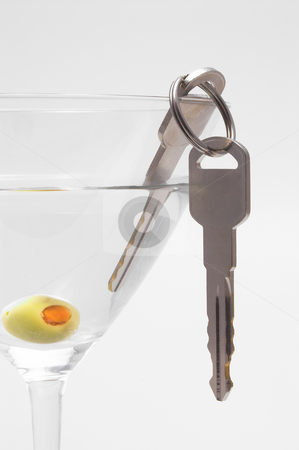 To use this stock image in your creative project, please select the size you need over to the right and click the "Add to Cart" button.
Your downloaded image will come with the Cutcaster watermark removed so don’t worry about the watermark you see on this page. Car Keys in Martini stock photo, Concept: Drinking and driving don't mix. by Robert Byron