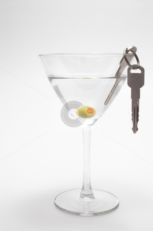 To use this stock image in your creative project, please select the size you need over to the right and click the "Add to Cart" button.
Your downloaded image will come with the Cutcaster watermark removed so don’t worry about the watermark you see on this page. Car Keys in Martini stock photo, Concept: Drinking and driving don't mix. by Robert Byron