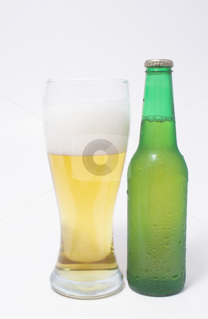 To use this stock image in your creative project, please select the size you need over to the right and click the "Add to Cart" button.
Your downloaded image will come with the Cutcaster watermark removed so don’t worry about the watermark you see on this page. Beer stock photo, A pilsner glass of beer and a beer in a bottle. by Robert Byron