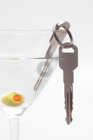 To use this stock image in your creative project, please select the size you need over to the right and click the "Add to Cart" button.
Your downloaded image will come with the Cutcaster watermark removed so don’t worry about the watermark you see on this page. Car Keys in Martini stock photo, Concept: Drinking and driving don't mix. by Robert Byron