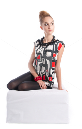 To use this stock image in your creative project, please select the size you need over to the right and click the "Add to Cart" button.
Your downloaded image will come with the Cutcaster watermark removed so don’t worry about the watermark you see on this page. Statuette stock photo, Fashion dressed beautiful girl by Valeriy Mazur