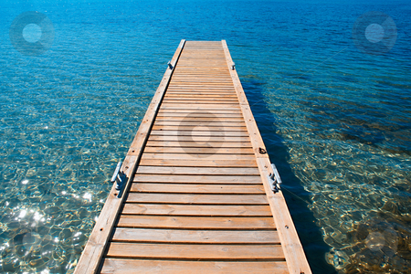 To use this stock image in your creative project, please select the size you need over to the right and click the "Add to Cart" button.
Your downloaded image will come with the Cutcaster watermark removed so don’t worry about the watermark you see on this page. Mediterranean Resort stock photo, View of the Mediterannean sea from a wood deck. by Serge VILLA