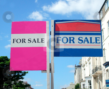 To use this stock image in your creative project, please select the size you need over to the right and click the "Add to Cart" button.
Your downloaded image will come with the Cutcaster watermark removed so don’t worry about the watermark you see on this page. Houses for sale signs stock photo, Two houses for sale signs in English street. by Martin Crowdy