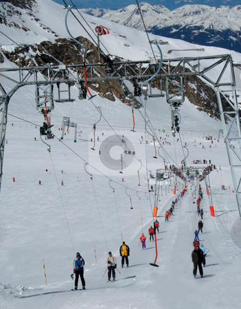 To use this stock image in your creative project, please select the size you need over to the right and click the "Add to Cart" button.
Your downloaded image will come with the Cutcaster watermark removed so don’t worry about the watermark you see on this page. Alpine ski lft stock photo, Details on alpine ski lift in Switzerland. by Martin Crowdy