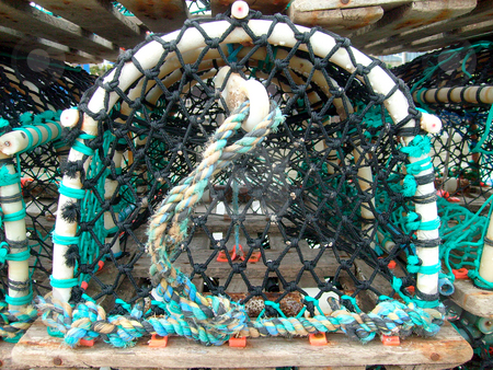 To use this stock image in your creative project, please select the size you need over to the right and click the "Add to Cart" button.
Your downloaded image will come with the Cutcaster watermark removed so don’t worry about the watermark you see on this page. Lobster Pot stock photo, Portrait of lobster pot seen in detail in harbor. by Martin Crowdy