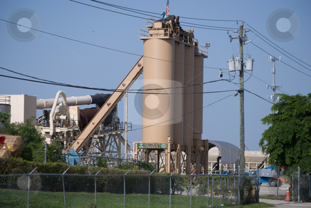To use this stock image in your creative project, please select the size you need over to the right and click the "Add to Cart" button.
Your downloaded image will come with the Cutcaster watermark removed so don’t worry about the watermark you see on this page. Cement Processing Plant stock photo, Cement processing plant silos by Robert Cabrera