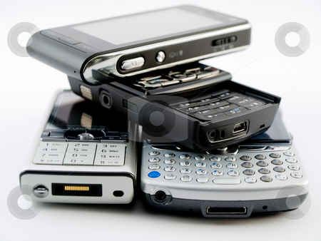 To use this stock image in your creative project, please select the size you need over to the right and click the "Add to Cart" button.
Your downloaded image will come with the Cutcaster watermark removed so don’t worry about the watermark you see on this page. Stack Pile of Several Modern Mobile Phones PDA Cell Handheld Uni stock photo, Stack Pile of Several Modern Mobile Phones PDA Cell Handheld Units Isolated on White Background by Robert Davies