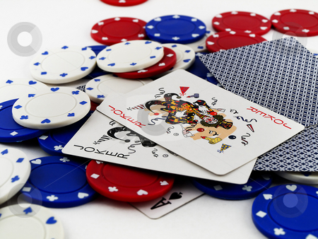 To use this stock image in your creative project, please select the size you need over to the right and click the "Add to Cart" button.
Your downloaded image will come with the Cutcaster watermark removed so don’t worry about the watermark you see on this page. Poker Chips and Joker Cards on White Background stock photo, Poker Chips and Joker Cards on White Background by Robert Davies