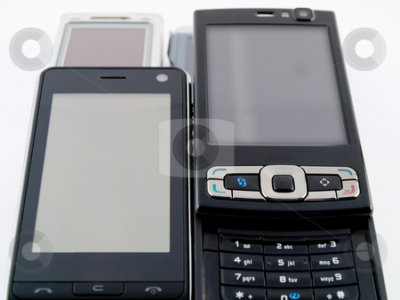 To use this stock image in your creative project, please select the size you need over to the right and click the "Add to Cart" button.
Your downloaded image will come with the Cutcaster watermark removed so don’t worry about the watermark you see on this page. Stack Pile of Several Modern Mobile Phones PDA Cell Handheld Uni stock photo, Stack Pile of Several Modern Mobile Phones PDA Cell Handheld Units Isolated on White Background by Robert Davies