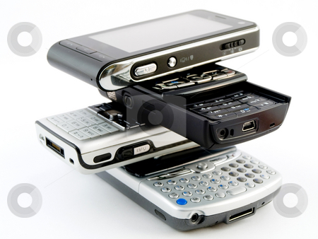 To use this stock image in your creative project, please select the size you need over to the right and click the "Add to Cart" button.
Your downloaded image will come with the Cutcaster watermark removed so don’t worry about the watermark you see on this page. Stack Pile of Several Modern Mobile Phones PDA Cell Handheld Uni stock photo, Stack Pile of Several Modern Mobile Phones PDA Cell Handheld Units Isolated on White Background by Robert Davies