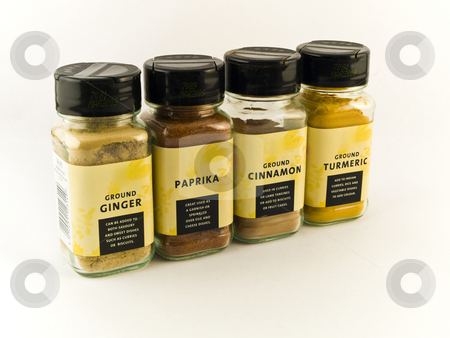 To use this stock image in your creative project, please select the size you need over to the right and click the "Add to Cart" button.
Your downloaded image will come with the Cutcaster watermark removed so don’t worry about the watermark you see on this page. Jars of Eastern Spices on White Background stock photo, Jars of Eastern Spices on White Background by Robert Davies