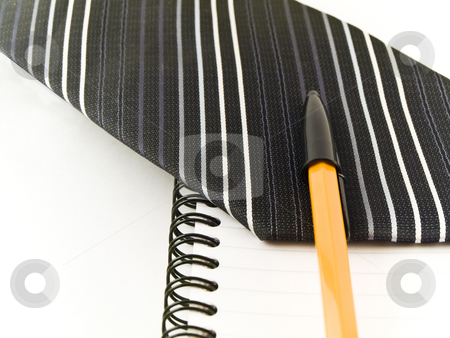 To use this stock image in your creative project, please select the size you need over to the right and click the "Add to Cart" button.
Your downloaded image will come with the Cutcaster watermark removed so don’t worry about the watermark you see on this page. Ballpoint Pen and Tie on Notebook White Background stock photo, Ballpoint Pen and Tie on Notebook White Background by Robert Davies