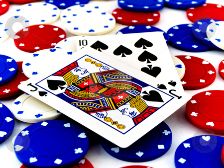 To use this stock image in your creative project, please select the size you need over to the right and click the "Add to Cart" button.
Your downloaded image will come with the Cutcaster watermark removed so don’t worry about the watermark you see on this page. Red White and Blue Poker Chips and Black Jack on White Backgroun stock photo, Red White and Blue Poker Chips and Black Jack on White Background by Robert Davies