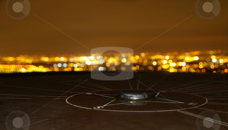 To use this stock image in your creative project, please select the size you need over to the right and click the "Add to Cart" button.
Your downloaded image will come with the Cutcaster watermark removed so don’t worry about the watermark you see on this page. Compass Monument Overlooking Cityscape stock photo, Compass Monument Overlooking Cityscape at Night by Robert Davies