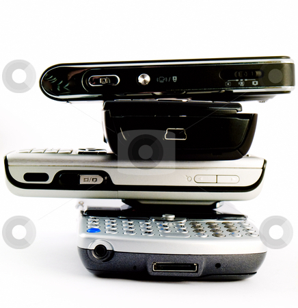 To use this stock image in your creative project, please select the size you need over to the right and click the "Add to Cart" button.
Your downloaded image will come with the Cutcaster watermark removed so don’t worry about the watermark you see on this page. Stack Pile of Several Modern Mobile Phones PDA Cell Handheld Uni stock photo, Stack Pile of Several Modern Mobile Phones PDA Cell Handheld Units Isolated on White Background by Robert Davies