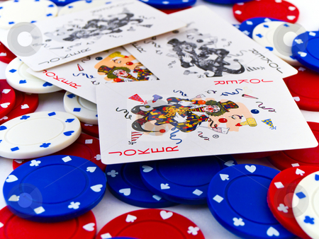 To use this stock image in your creative project, please select the size you need over to the right and click the "Add to Cart" button.
Your downloaded image will come with the Cutcaster watermark removed so don’t worry about the watermark you see on this page. Red White and Blue Poker Chips and Jokers on White Background stock photo, Red White and Blue Poker Chips and Jokers on White Background by Robert Davies