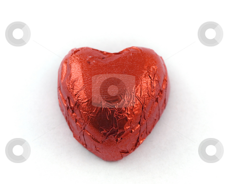 To use this stock image in your creative project, please select the size you need over to the right and click the "Add to Cart" button.
Your downloaded image will come with the Cutcaster watermark removed so don’t worry about the watermark you see on this page. Heart Shaped Chocolate in Red Tin Foil stock photo, Heart Shaped Chocolate in Red Tin Foil by Robert Davies