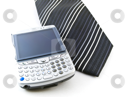 To use this stock image in your creative project, please select the size you need over to the right and click the "Add to Cart" button.
Your downloaded image will come with the Cutcaster watermark removed so don’t worry about the watermark you see on this page. PDA Mobile Phone and Tie on White Background stock photo, Mobile Phone and Tie on White Background by Robert Davies