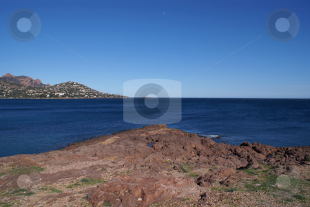To use this stock image in your creative project, please select the size you need over to the right and click the "Add to Cart" button.
Your downloaded image will come with the Cutcaster watermark removed so don’t worry about the watermark you see on this page. Esterel stock photo, Red rock and blue sea for the Mediterranean coast in French Riviera. Esterel Coast by Serge VILLA
