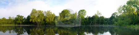 To use this stock image in your creative project, please select the size you need over to the right and click the "Add to Cart" button.
Your downloaded image will come with the Cutcaster watermark removed so don’t worry about the watermark you see on this page. Panoramic Lake Pond With Trees and Reflection stock photo, Panoramic Lake Pond With Trees and Reflection at Dawn in British Summer by Robert Davies