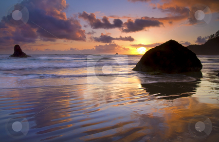To use this stock image in your creative project, please select the size you need over to the right and click the "Add to Cart" button.
Your downloaded image will come with the Cutcaster watermark removed so don’t worry about the watermark you see on this page. Ecola Sunset stock photo, Indian Beach ablaze in reflected color on the wet sand. Tillamook Rock lighthouse hides under the setting sun on the Horizon by Mike Dawson