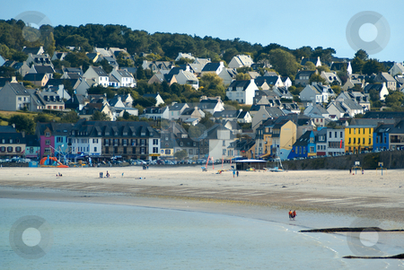 To use this stock image in your creative project, please select the size you need over to the right and click the "Add to Cart" button.
Your downloaded image will come with the Cutcaster watermark removed so don’t worry about the watermark you see on this page. Brittany Colors stock photo, Sand Beach against a small Brittany village with colored houses by Serge VILLA