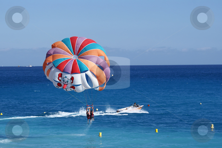 To use this stock image in your creative project, please select the size you need over to the right and click the "Add to Cart" button.
Your downloaded image will come with the Cutcaster watermark removed so don’t worry about the watermark you see on this page. Parachute stock photo, A motorboat with parachute prepared for parasailing by Serge VILLA