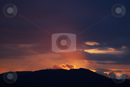 To use this stock image in your creative project, please select the size you need over to the right and click the "Add to Cart" button.
Your downloaded image will come with the Cutcaster watermark removed so don’t worry about the watermark you see on this page. Rays of Sun stock photo, Photo of sun shine through rain cloud. by Serge VILLA