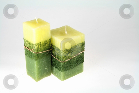 To use this stock image in your creative project, please select the size you need over to the right and click the "Add to Cart" button.
Your downloaded image will come with the Cutcaster watermark removed so don’t worry about the watermark you see on this page. Candle light stock photo, Green fancy candle lights isolated on white background by Jonas Marcos San Luis