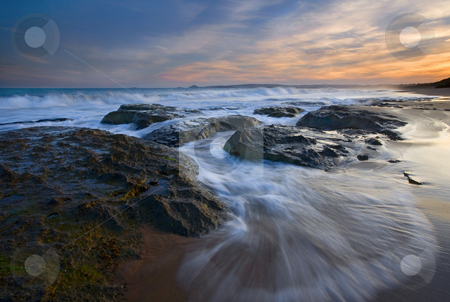 To use this stock image in your creative project, please select the size you need over to the right and click the "Add to Cart" button.
Your downloaded image will come with the Cutcaster watermark removed so don’t worry about the watermark you see on this page. Covering the Beach stock photo, The waves of the incoming tide pounding the beaches of Encounter bay near Victor Harbor, South Australia by Mike Dawson