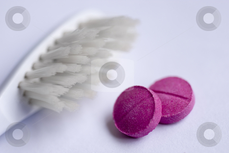 To use this stock image in your creative project, please select the size you need over to the right and click the "Add to Cart" button.
Your downloaded image will come with the Cutcaster watermark removed so don’t worry about the watermark you see on this page. Clean your teeth stock photo, Tooth brush and two dental disclosing tablets by Stephen Gibson
