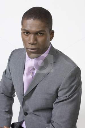 To use this stock image in your creative project, please select the size you need over to the right and click the "Add to Cart" button.
Your downloaded image will come with the Cutcaster watermark removed so don’t worry about the watermark you see on this page. African American Professional stock photo, Black Business man by Csaba Fikker