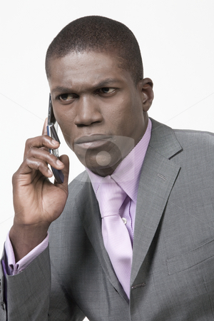 To use this stock image in your creative project, please select the size you need over to the right and click the "Add to Cart" button.
Your downloaded image will come with the Cutcaster watermark removed so don’t worry about the watermark you see on this page. Black Businessman looking worried stock photo, Black Businessman looking worried on the phone by Csaba Fikker