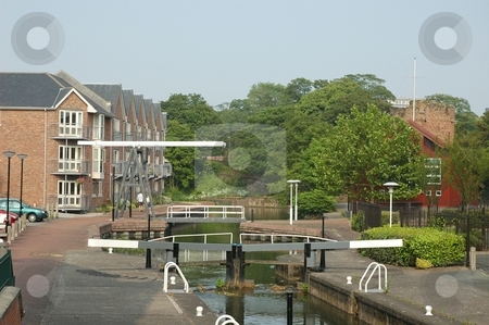 To use this stock image in your creative project, please select the size you need over to the right and click the "Add to Cart" button.
Your downloaded image will come with the Cutcaster watermark removed so don’t worry about the watermark you see on this page. Cheshire Chester UK stock photo, Chester canal locks Cheshire UK by Ray Roscoe