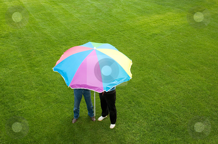 To use this stock image in your creative project, please select the size you need over to the right and click the "Add to Cart" button.
Your downloaded image will come with the Cutcaster watermark removed so don’t worry about the watermark you see on this page. People under a parasol stock photo, People under a parasol by Mpixis World