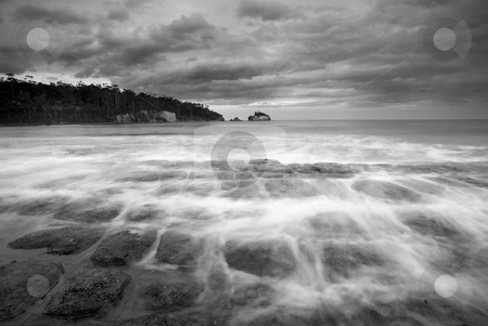 To use this stock image in your creative project, please select the size you need over to the right and click the "Add to Cart" button.
Your downloaded image will come with the Cutcaster watermark removed so don’t worry about the watermark you see on this page. Flooding the Cracks stock photo, Rising Tides Flood the cracks of Tesselated PAvement as a storm brews off the coast of the Tasman PEninsula. by Mike Dawson