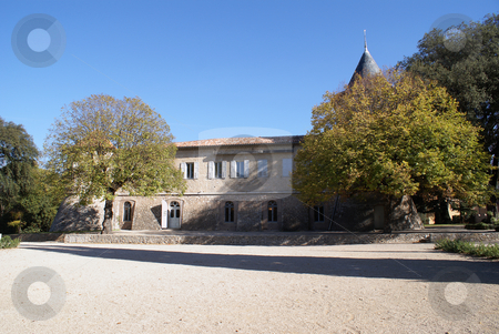 To use this stock image in your creative project, please select the size you need over to the right and click the "Add to Cart" button.
Your downloaded image will come with the Cutcaster watermark removed so don’t worry about the watermark you see on this page. Provencal House stock photo, Castle in the village of