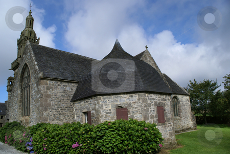 To use this stock image in your creative project, please select the size you need over to the right and click the "Add to Cart" button.
Your downloaded image will come with the Cutcaster watermark removed so don’t worry about the watermark you see on this page. Gothic church stock photo, Gothic church in a small village of Brittany by Serge VILLA