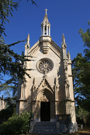 To use this stock image in your creative project, please select the size you need over to the right and click the "Add to Cart" button.
Your downloaded image will come with the Cutcaster watermark removed so don’t worry about the watermark you see on this page. Church stock photo, Small church near the city of